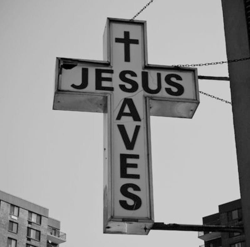 хрест-вивіска «JESUS SAVES»